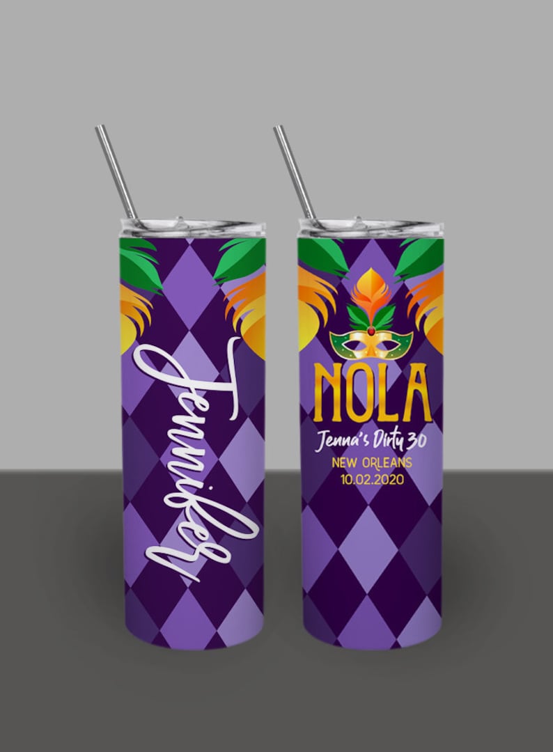 May include: Two purple and gold stainless steel tumblers with a Mardi Gras theme. One tumbler says "Jennifer" and the other says "NOLA Jenna's Dirty 30 New Orleans 10.02.2020".