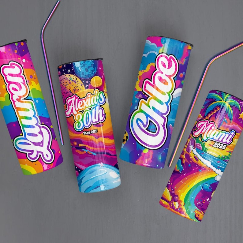 May include: Four colorful insulated tumblers with rainbow, space, and tropical designs. Each tumbler features a name or text: "Lauren", "Alexia's 30th May 2026", "Chloe", and "Miami 2026". Two tumblers have iridescent straws.