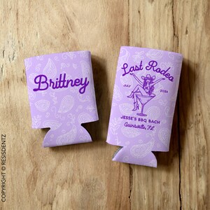 Personalized Last Rodeo bachelorette can cozies featuring a Western-themed design with a paisley background and a cowgirl in a martini glass. Customizable with names, event details, and available in multiple colors. Designed for slim and standard 12oz cans, these insulated drink holders are perfect for bachelorette parties, birthdays, and country music festivals.