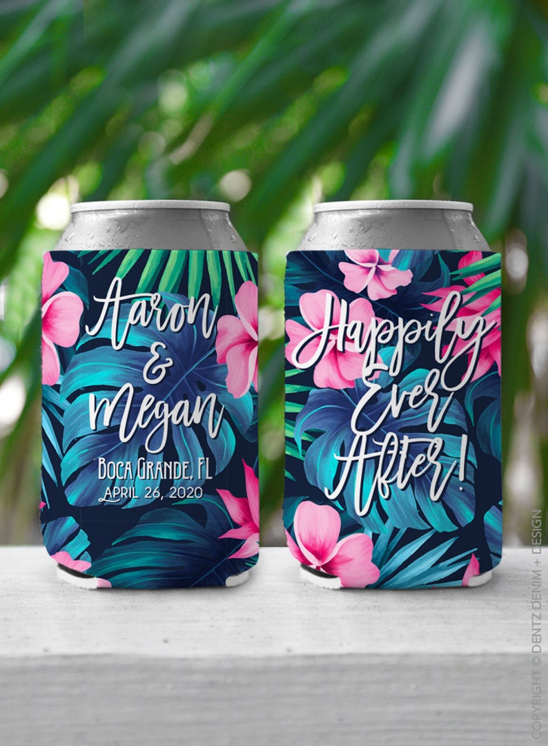 May include: Two tropical-themed beverage insulators with a floral design. One insulator says "Aaron & Megan" with the text "Boca Grande, FL April 26, 2020". The other insulator says "Happily Ever After!"