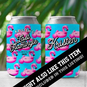 May include: Two blue and pink can coolers with a flamingo pattern. One cooler says "Kristen's Last Flamingle South Beach, Miami 2019" and the other says "Kristen".