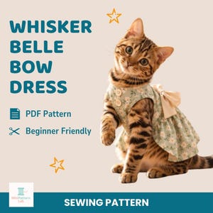 May include: A sewing pattern titled Whisker Belle Bow Dress featuring a PDF pattern and beginner friendly instructions. The image shows a tabby cat wearing a light green floral dress with two buttons and a cream bow on the back.