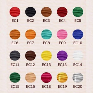 May include: A color chart of elastic chord in various colors, including red, black, brown, burgundy, green, orange, teal, pink, blue, gray, yellow, purple, white, beige, gold, and silver. The text "ELASTIC CHORD" is at the top.