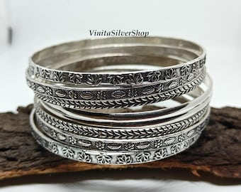 Geoxideerde sterling zilveren armbanden met bloemenmotief, vintage design, handgemaakt.
