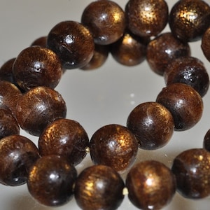 7.4&quot; &quot;Magical Hai Liu/Top Grade&quot;~Genuine Indonesia Golden Black CORAL SEA WILLOW (海柳) Stretch Bracelet - 7mm - 27 Beads - I1334