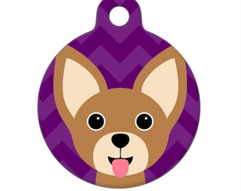 May include: A round purple and white chevron patterned dog tag with a cartoon brown chihuahua with a pink tongue sticking out.
