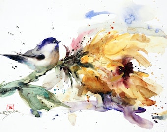 May include: A watercolor painting of a small blue bird perched on a sunflower. The sunflower is yellow and brown with a purple center. The background is white with splashes of blue and green.