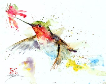 May include: Watercolor painting of a hummingbird in flight, with a red flower in its beak. The background is a white canvas with splashes of color.