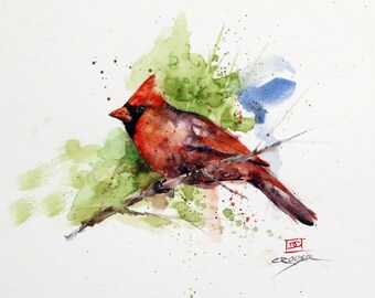 May include: Watercolor painting of a red cardinal perched on a branch with green and blue watercolor splatter in the background. The artist's signature, "DC Crouser", is in the bottom right corner.