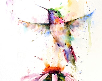 May include: Watercolor painting of a hummingbird in flight with its wings spread wide. The hummingbird is painted in shades of green, blue, purple, and pink. The hummingbird is hovering over a pink flower with a yellow center.