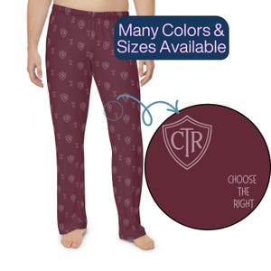 May include: Burgundy pajama pants with a repeating shield pattern. The shield design includes the letters "CTR". The text "Many Colors & Sizes Available" is in a blue rectangle. The text "Choose the Right" is in a circle.