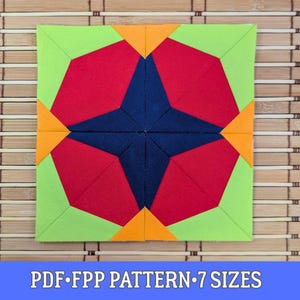 May include: A geometric quilt block featuring a navy blue starburst design at the centre, framed by red, orange, and lime green shapes. The text "PDF FPP PATTERN 7 SIZES" is at the bottom. The block is on a bamboo mat.
