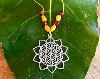 Flower of life Pendant on gold string with Amber