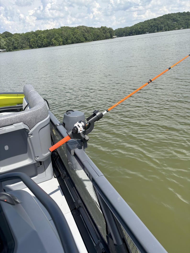 Fishing pole mounted to SEADOO SWITCH rail with LBW 2-peg mount.