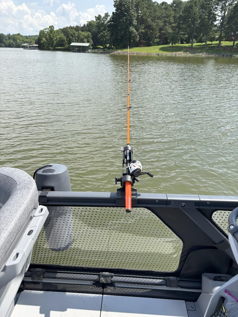 Fishing pole mounted to SEADOO SWITCH rail with LBW 2-peg mount.