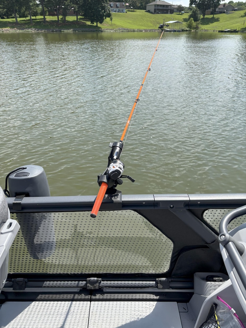 Fishing pole mounted to SEADOO SWITCH rail with LBW 2-peg mount.