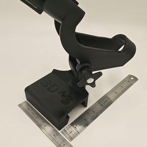 LBW 2-peg mount seated in rail clip with sizing reference.