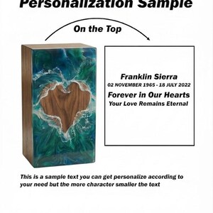 May include: A wooden box with a heart-shaped cutout, filled with a blue and green resin design. The text reads "Personalization Sample" and "On the Top". The box has the name "Franklin Sierra" and dates.