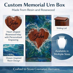 May include: Custom memorial urn box made from resin and rosewood. Features an ocean-inspired resin design with a heart-shaped rosewood inlay. The box has a sliding lid and is available in multiple sizes. The heart-shaped inlay is personalized with the name "John".