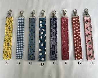 Stoffen sleutelhanger-polsbandje | Handgemaakte sleutelhanger | Leuke stoffen sleutelhanger voor dames | Sleutelhouder polskoord