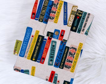 Una idea novedosa: funda acolchada y acogedora para Kindle, lector electrónico Kobo Paperwhite, estantería, rifle, Paper Co., libros, bookish