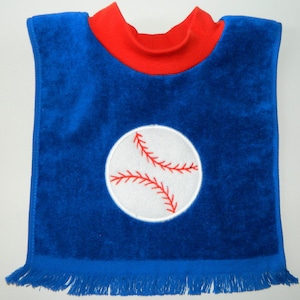 May include: Blue and red baby bib with a white baseball embroidered on the front. The bib has a fringe trim.