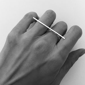 Anillo de barra asimétrico