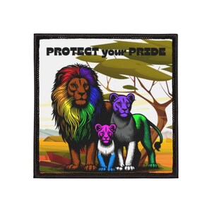 May include: A square patch with a pride-themed illustration of a lion family. The adult lion has a rainbow mane, and the cubs are pink, blue, and green. The text "PROTECT your PRIDE" is at the top.