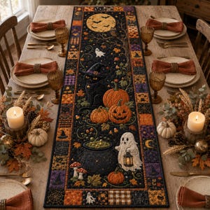May include: A rectangular quilted table runner featuring a black background with Halloween motifs including a full moon, a black cat, pumpkins, a ghost holding a lantern, a cauldron, and mushrooms, bordered by a patchwork of orange and purple patterns.
