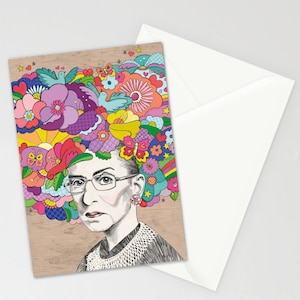 May include: A colorful illustration of a woman with flowers, butterflies, and birds in her hair. The woman is wearing glasses and a collared shirt.