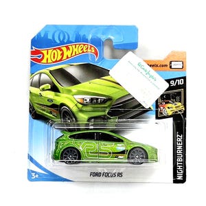May include: A green Hot Wheels Ford Focus RS die-cast toy car on a blue and white card. The car has black wheels and the number 25 on the side. The card has the Hot Wheels logo and the text "NIGHTBURNERZ".