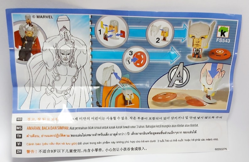 Puede incluir: Una hoja de instrucciones de Marvel para una figura de Thor. La hoja presenta una ilustraci&oacute;n de Thor, instrucciones de montaje y una peque&ntilde;a figura ensamblada. El fondo es blanco con detalles azules.