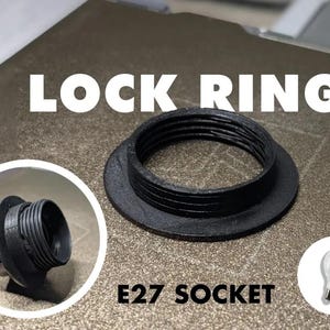 Puede incluir: Componentes negros de enchufe E27, incluido un anillo de bloqueo y una base roscada, se muestran sobre un fondo neutro. Los textos "LOCK RING" y "E27 SOCKET" se muestran. También se incluye un gráfico de bombilla.