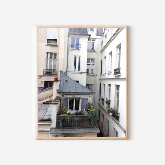 Paris Balcony Photography Print, Vertical Parisian Apartment Facade with Ironwork Balcony, Green Plants, and French Bistro Table Wall Art