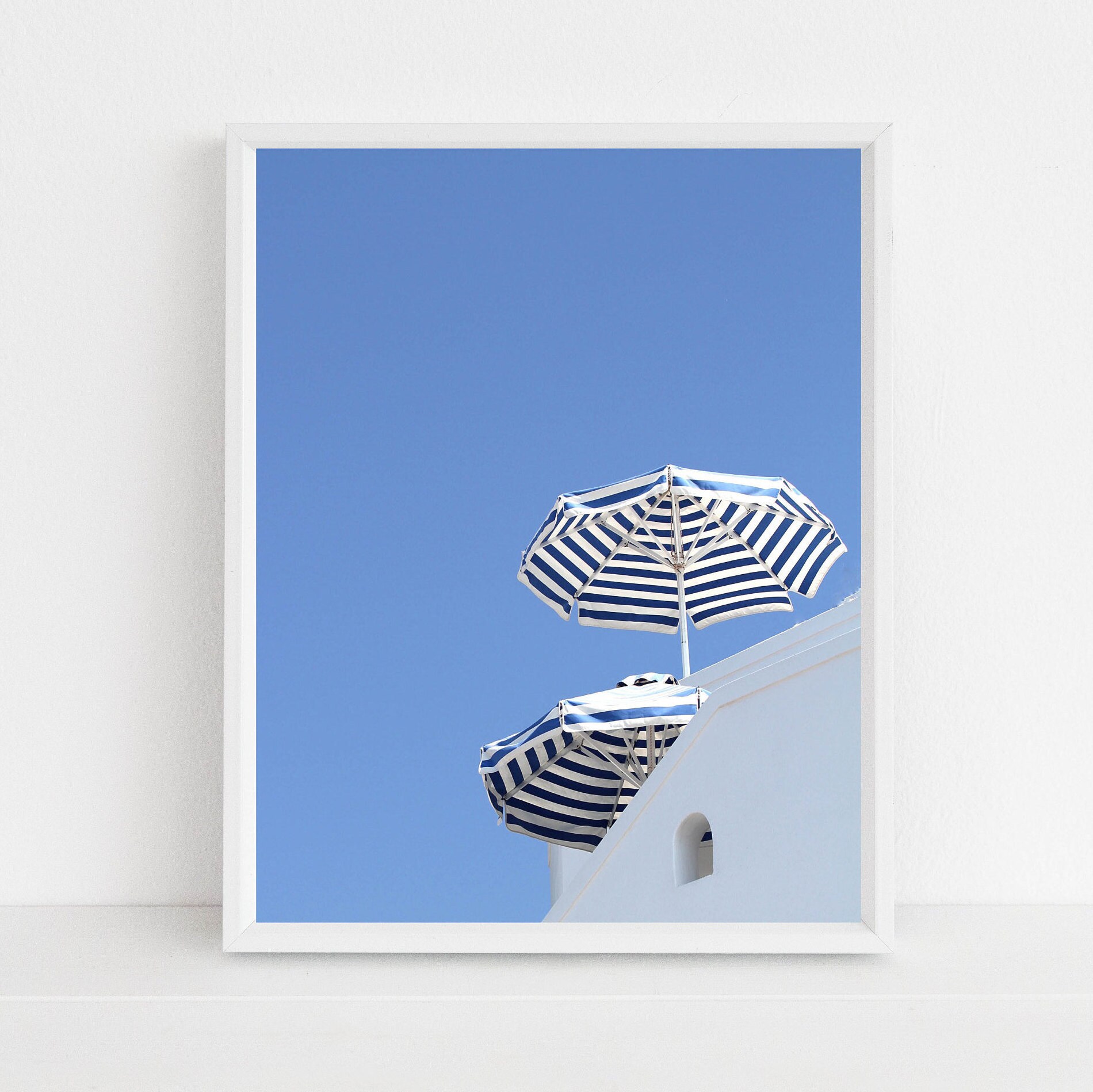 Striped Blue and White Beach Umbrella Photography Print from Santorini