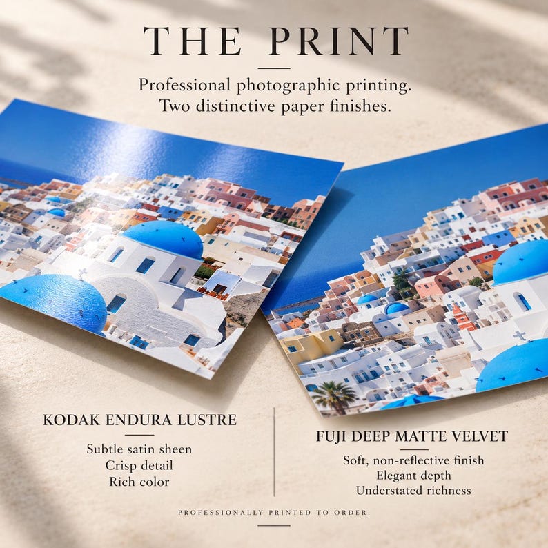 May include: Two photographic prints featuring a Greek island landscape with white buildings and blue domes. Text includes THE PRINT, Professional photographic printing, Two distinctive paper finishes, KODAK ENDURA LUSTRE, Subtle satin sheen, Crisp detail, Rich color, FUJI DEEP MATTE VELVET, Soft, non-reflective finish, Elegant depth, Understated richness, PROFESSIONALLY PRINTED TO ORDER.