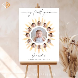 Puede incluir: Un letrero blanco sobre un caballete de madera presenta un diseño de girasol con una foto central rodeada de 12 fotos más pequeñas. El letrero dice "my first year" e incluye el nombre "Samantha" y una fecha.