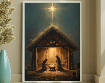 May include: A framed print depicting the Nativity scene. The artwork shows a star shining above a wooden stable, with figures kneeling around a manger. The image has a warm, inviting color palette and a sense of reverence.