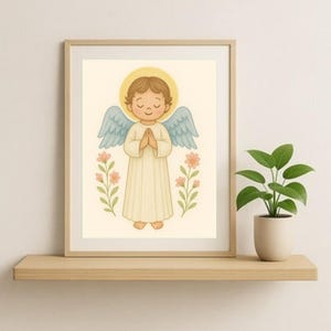 May include: A framed illustration of a cartoon angel with brown hair, a golden halo, and blue wings. The angel is wearing a white robe and has its hands clasped in prayer. Pink flowers and green stems flank the angel. The artwork is displayed on a wooden shelf.