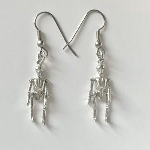 sterling silver movable Skeleton charm earrings, vintage, NOS jewelry