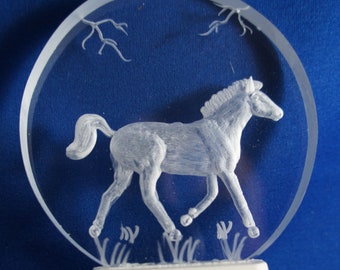 May include: A white porcelain nightlight with a clear glass dome featuring a white etched image of a horse running through a field of grass.