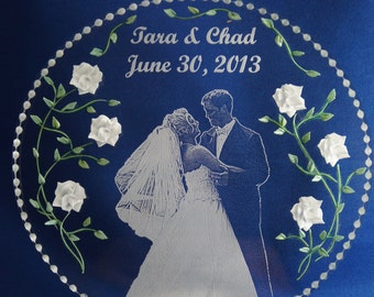 your photo etched with 3D hand engraved flowers acrylic clear glass-like cake topper/gift that celebrates this very special occasion.