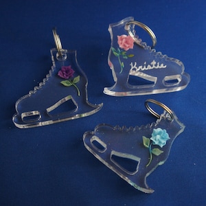 Personalized Ice skate bag tag or keychain, the rose is 3 D etched in thick acrylic with engraved words of your choice, a great gift !