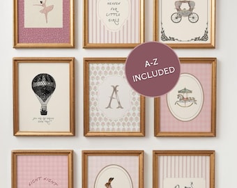 May include: Nine framed prints with gold frames, featuring illustrations of a ballerina, hot air balloon, carriage, rabbit, swan, and carousel. The prints have pink and white backgrounds with text that reads "Thank Heaven for Little Girls" and "Night Night Sleep Tight".