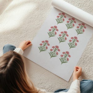 Printable pink chinoiserie floral art with delicate green leaves and blush blossoms arranged in a repeated pattern, ideal for a modern southern botanical gallery wall. This girls room printable doubles as cottagecore nursery decor or vintage floral art, echoing grandmillennial design trends with coastal preppy influences. Offered as a digital download, this green and pink wall print is versatile for framing and gifting in southern or coastal-inspired interiors.