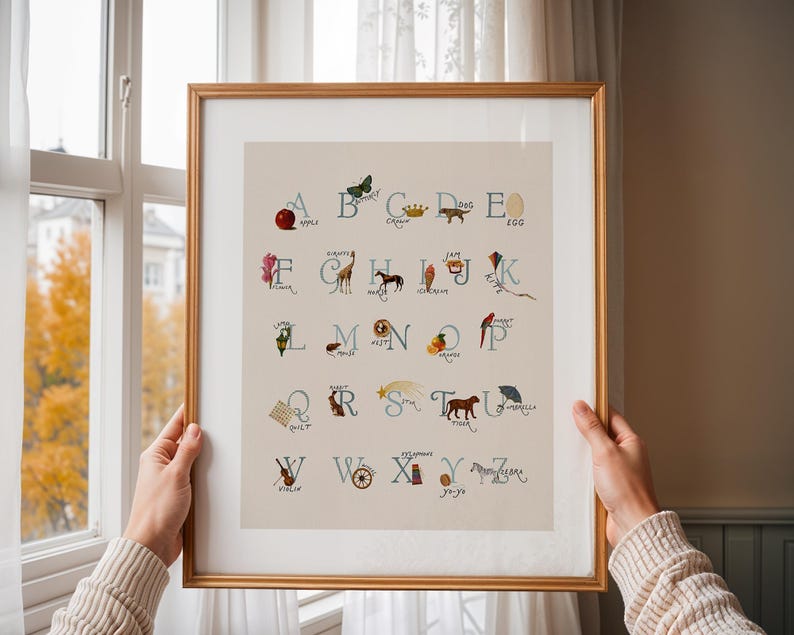 Alphabet poster with hand-drawn style lettering and vintage-inspired illustrations from A to Z, including flower, giraffe, horse, ice cream, jam, and kite. This cute abc poster suits a cottagecore kids room and vintage boy nursery aesthetic, ideal as printable wall art. Cute alphabet decor for educational playroom wall art, playroom wall decor, and boho classroom decor.