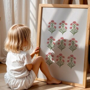 Digital floral wall art featuring hand-painted pink blossoms and sage green stems, ideal for a grandmillennial girls room or cottagecore nursery printable. This green and pink botanical artwork has a chinoiserie influence, perfect for southern floral art and vintage inspired digital decor. Offered as a digital download, this print also complements coastal grandma interiors and coastal preppy wall art styles for timeless, versatile home design.