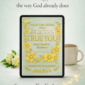 May include: A digital tablet shows the book cover of "TRUE YOU" by Christine Woodard. The cover has yellow floral designs and the text "VALLEY GIRL GOSPEL." A cup of coffee and white flowers are also visible. The image includes the text "Start seeing yourself the way God already does."