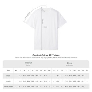 May include: A white Comfort Colors 1717 t-shirt with measurements for width, length, and sleeve length. The size chart includes measurements in inches and centimeters for sizes XS to 5XL. The chart also includes measurements in centimeters.