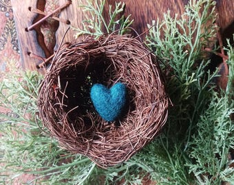 Hand made felted wool heart peacock